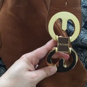 Escada tan suede purse with a creme stitching and hot pink lining